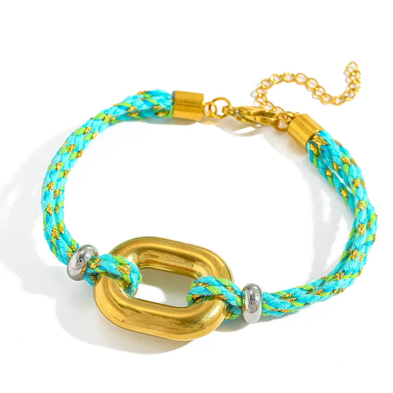 Bracelet with turquoise and gold design on a white background