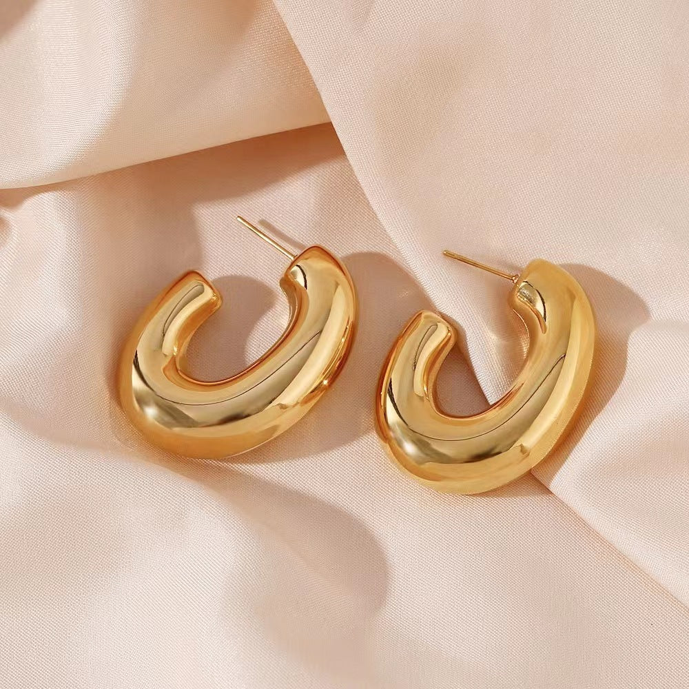 C shape gold earrings