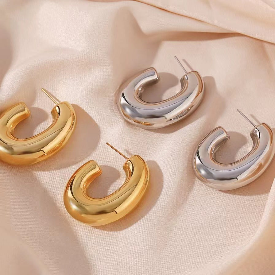 C shape gold earrings