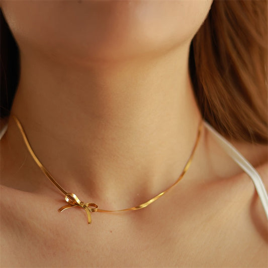 Coquette gold necklaces